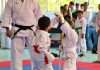 Artes marciales: El regalo que transforma la vida de tus hijos en este Día del Niño Niños practicando artes marciales y aprendiendo disciplina en el Día del Niño