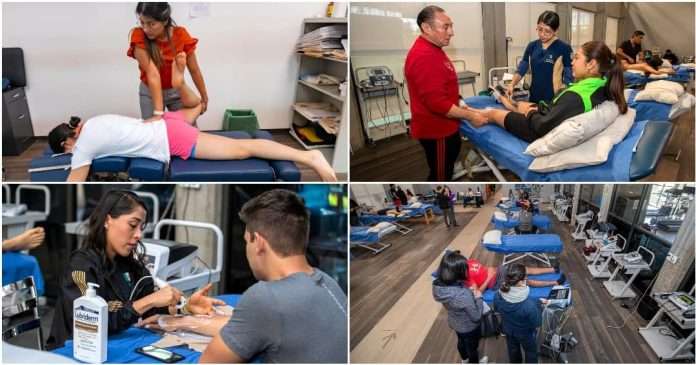 Especialista de la CONADE aplicando terapia de rehabilitación funcional a un deportista de alto rendimiento.
