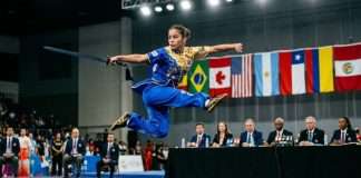 Buenos Aires será sede del histórico doble Campeonato Panamericano de Wushu y Kungfu 2026 Atleta de alto rendimiento ejecutando una rutina de Taolu con espada en un torneo panamericano.